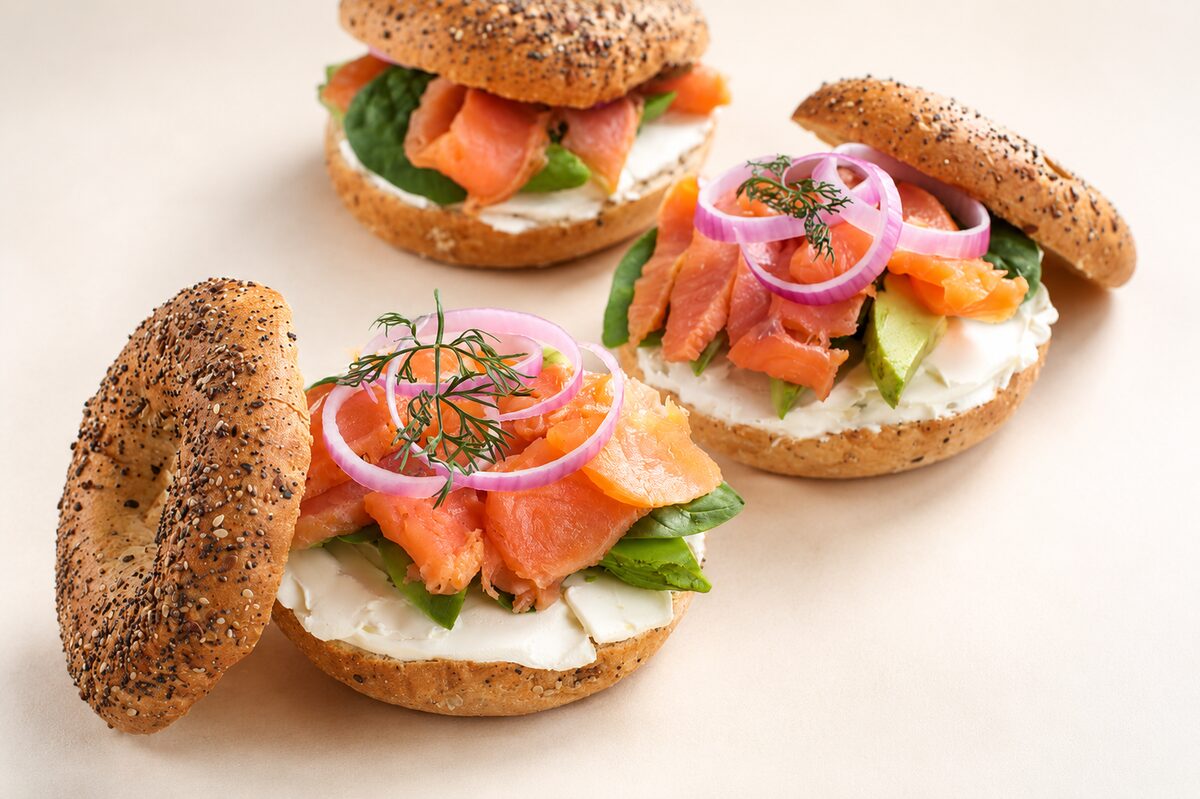 Bagel and lox spread with smoked salmon, cream cheese, tomatoes and onions