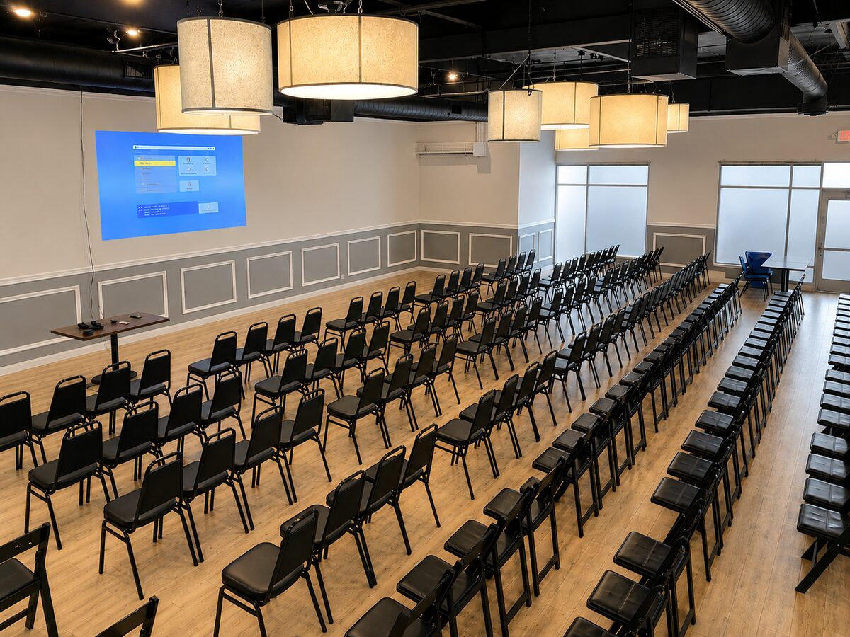 Banquet room in theater seating for a corporate luncheon and presentation