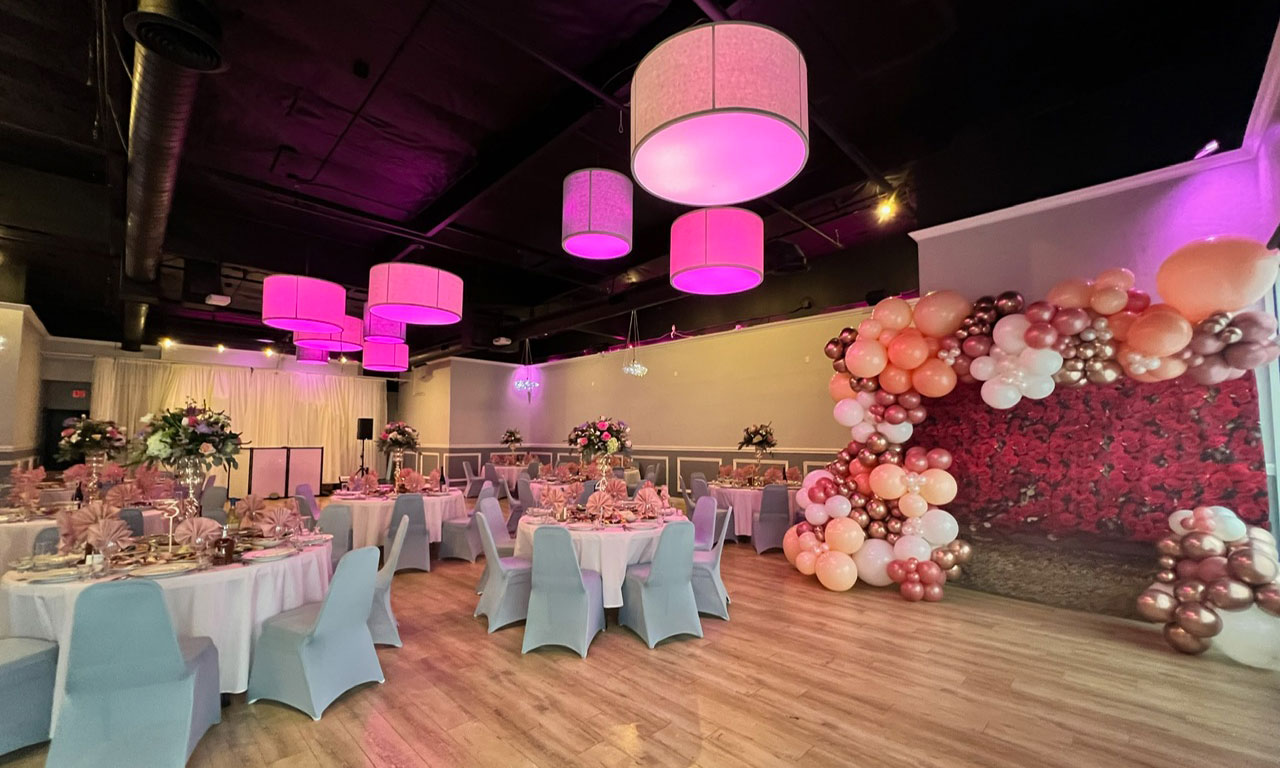 Elijah's private banquet room with round tables set for an event