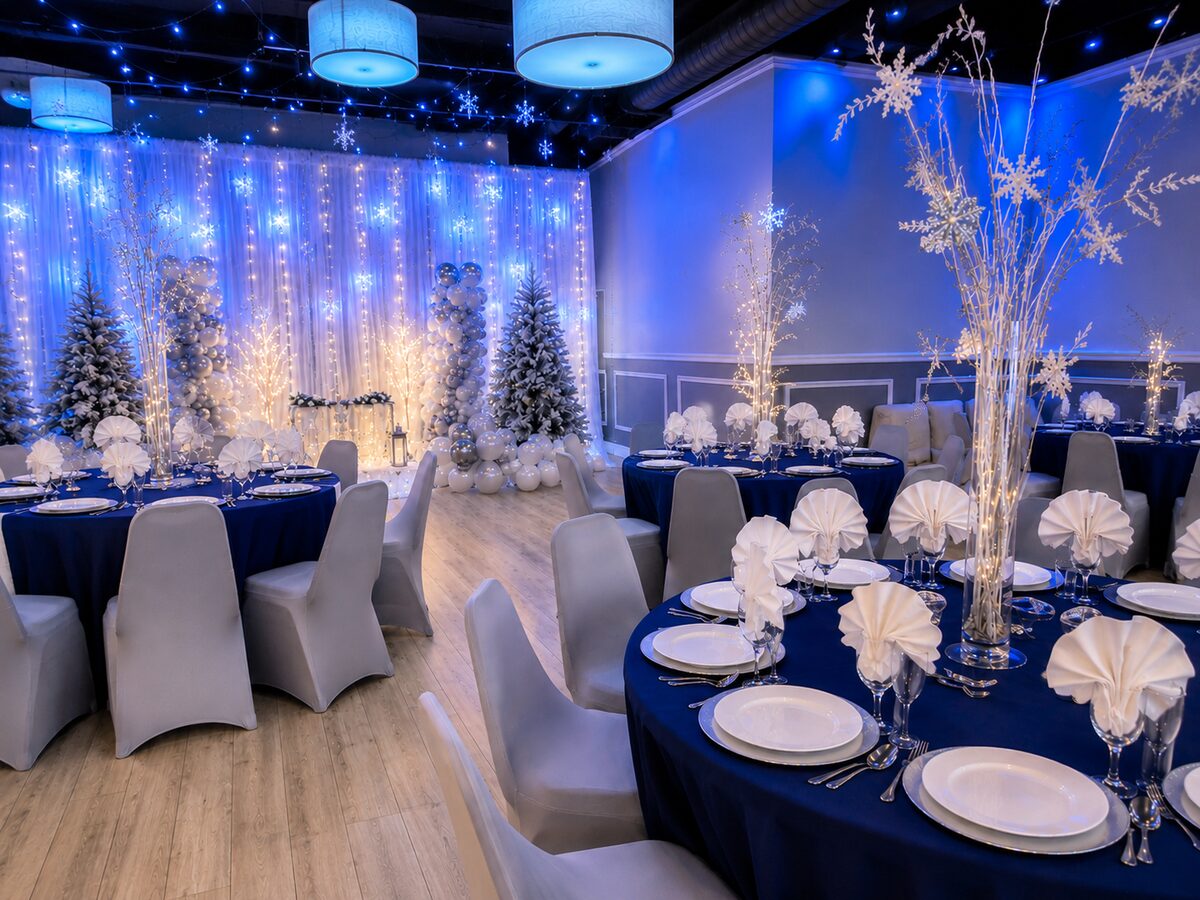 Banquet room with winter holiday decorations and set tables