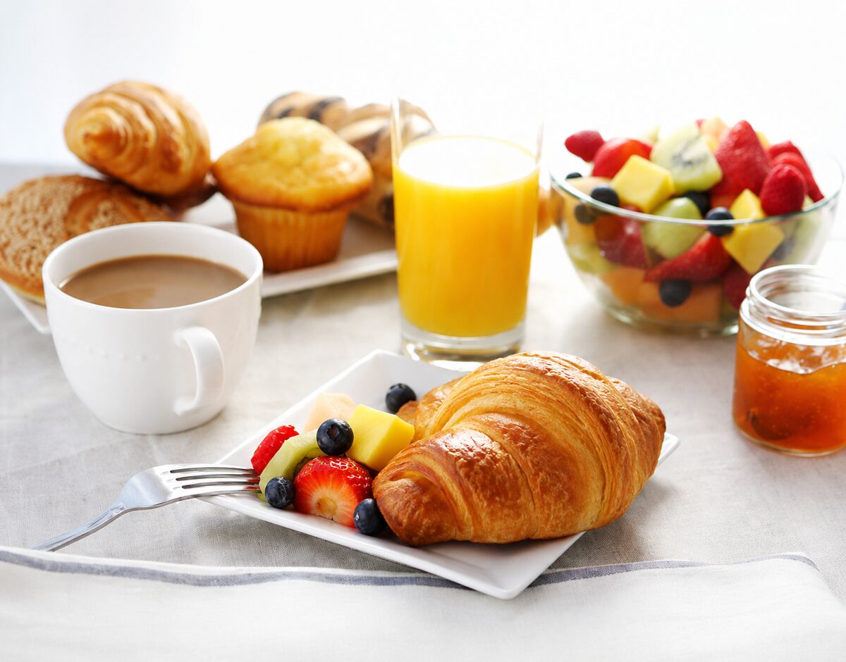 Continental breakfast with pastries, fruit, coffee and juice