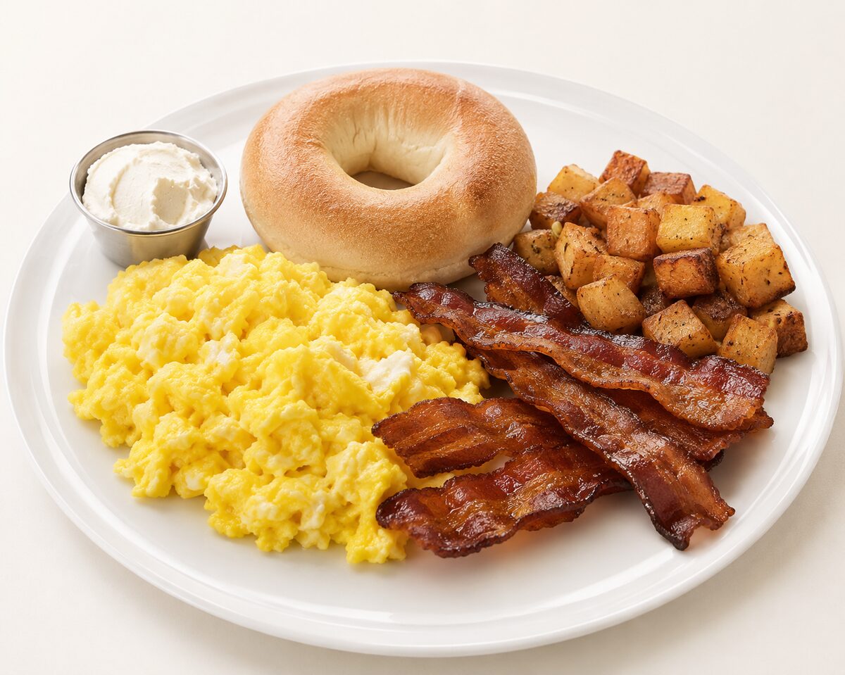 Power breakfast buffet with scrambled eggs, bacon and potatoes