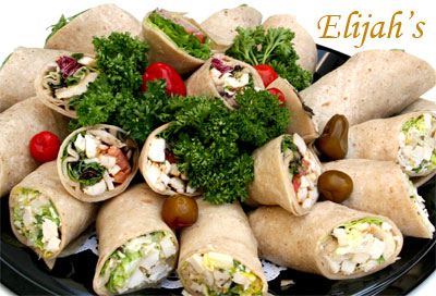 Sandwich and deli platters arranged for a party