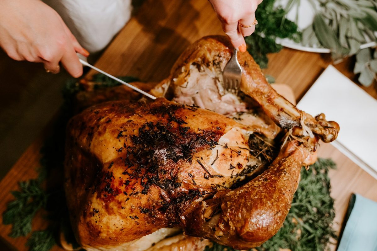 Thanksgiving turkey dinner spread with sides